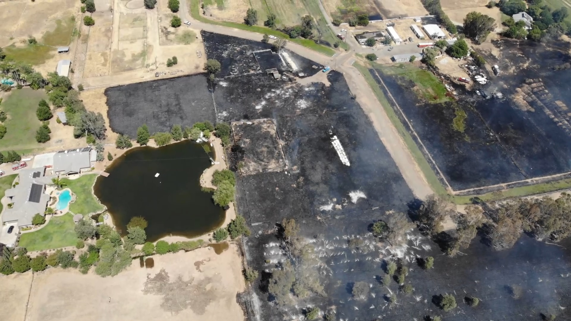 Barn and vacant mobile home destroyed in a large grass fire outside Clovis